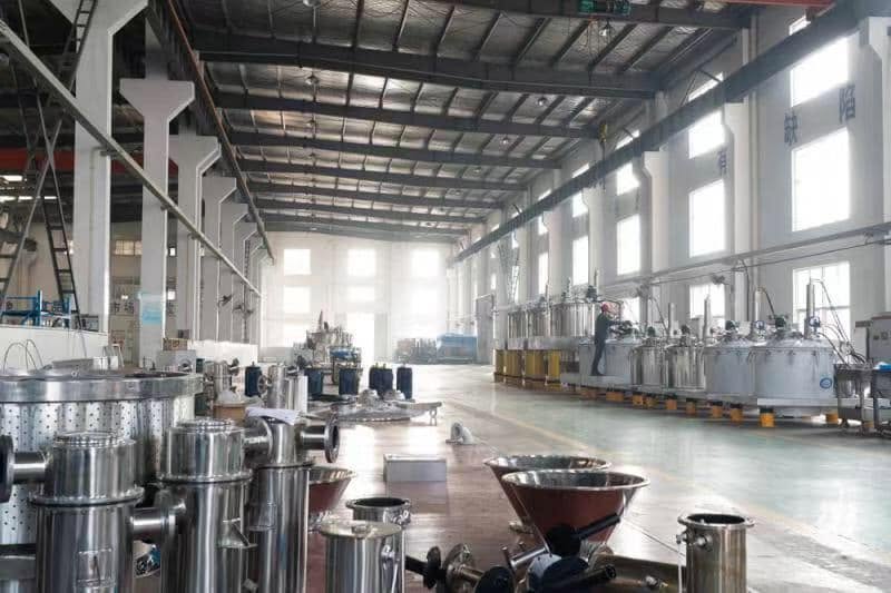 Wide view of the Jowin Machinery production floor with centrifuge units in assembly